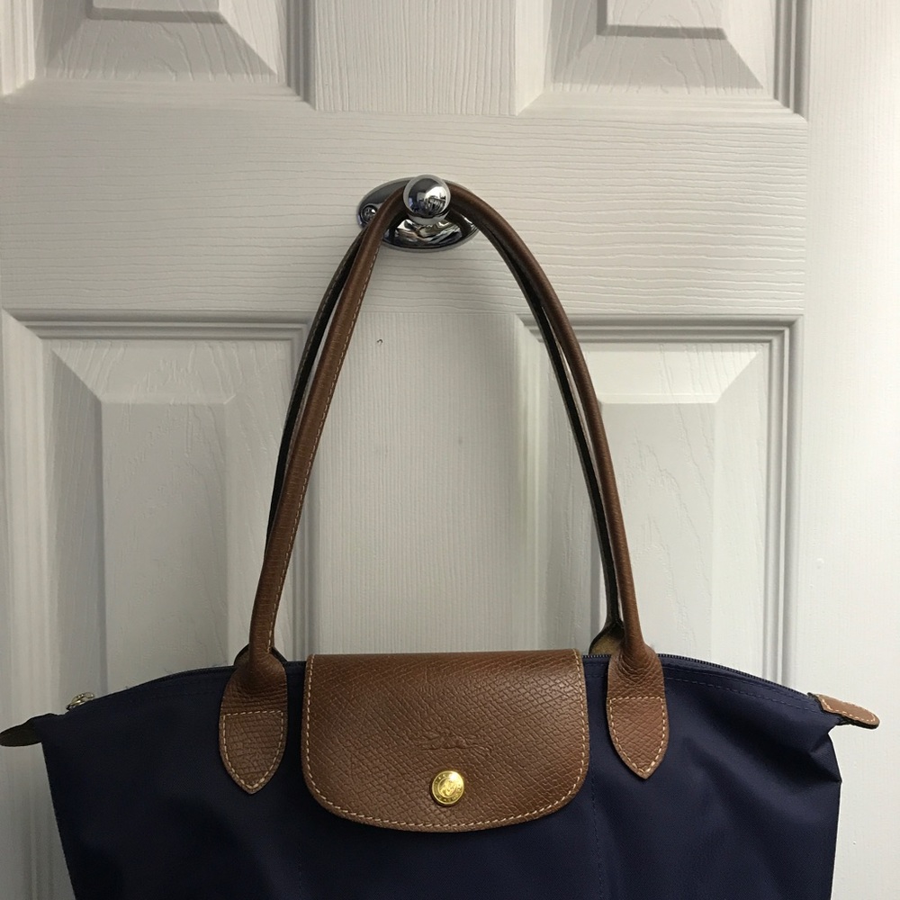 Navy Longchamp. Small with long handles.